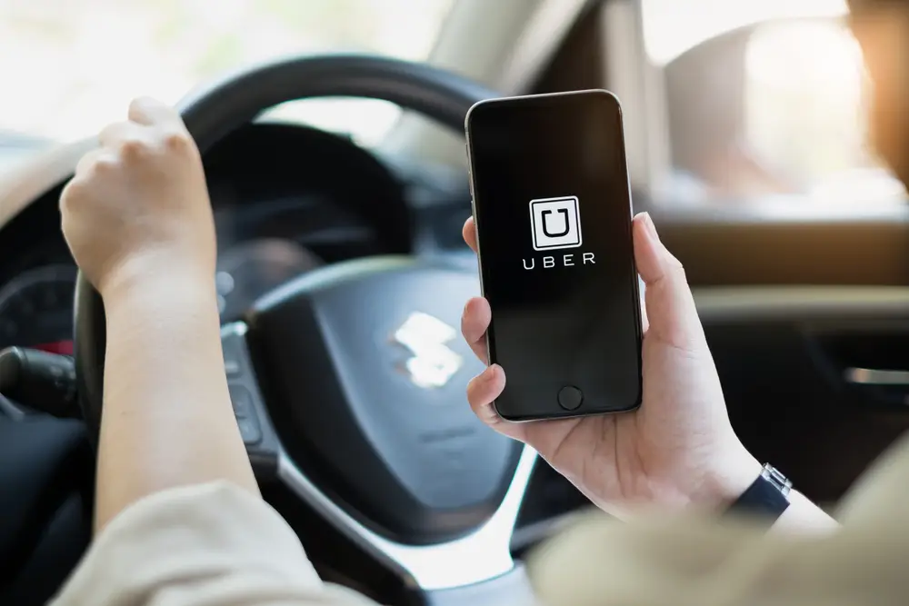 Pictured is a hypothetical female Uber driver