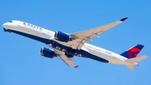 Delta Air Lines aircraft in flight, related to the arrest of a pilot facing child sexual abuse charges in California.