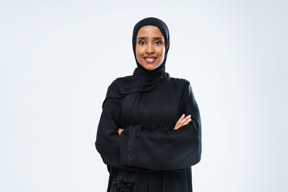 An anonymous Somali woman, dressed in traditional black Muslim attire.