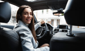 A female drivers, symbolic of the Uber pilot program that matches female passengers with female drivers.