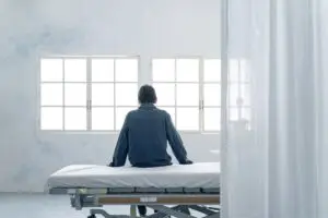 Depiction of a depressed patient at a psychiatric hospital.