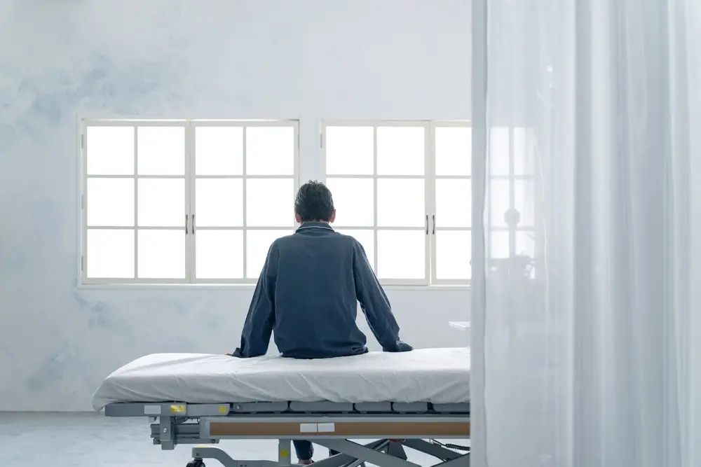 Depiction of a depressed patient at a psychiatric hospital.