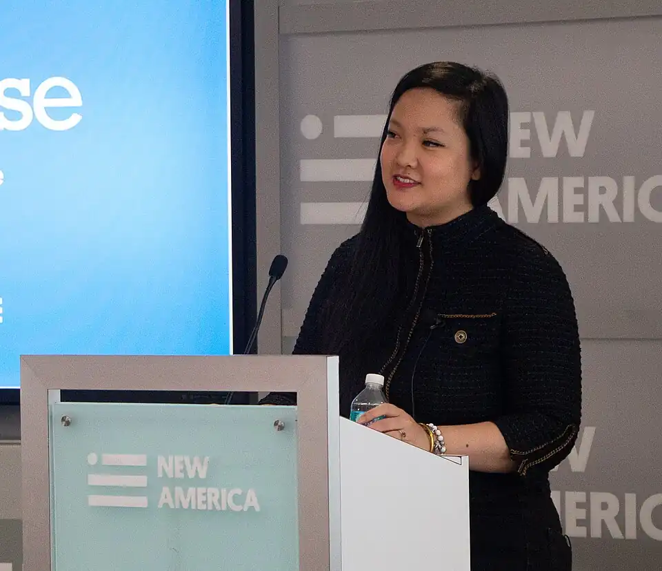 Wai Ling “Wyllie” Nguyen speaking at a podium at New America event.