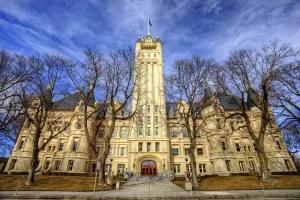 Spokane County Courthouse in Washington, historic building with central tower and surrounding trees.