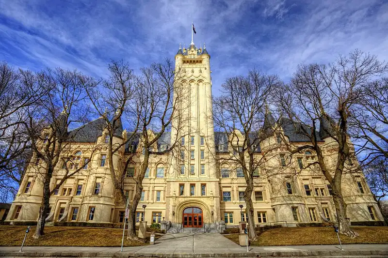 Spokane County Courthouse in Washington, historic building with central tower and surrounding trees.