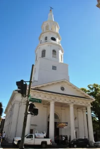 Survivors Rights | Sexual Misconduct Allegations Target Head of Anglican Church in North America St. Michael’s Episcopal Church in Charleston, South Carolina, featuring its white steeple and columned entrance on the corner of Meeting Street.