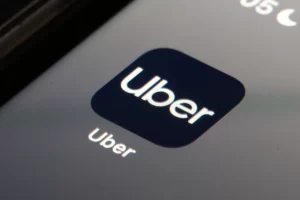 Close-up of the Uber app icon displayed on a smartphone screen