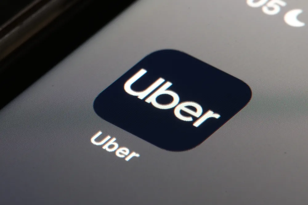 Close-up of the Uber app icon displayed on a smartphone screen