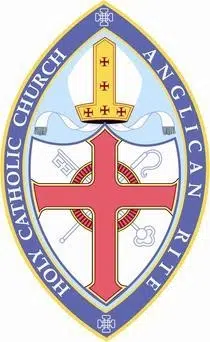 Official emblem of the Holy Catholic Church Anglican Rite, featuring a red cross, a gold mitre, and symbolic ecclesiastical elements within a blue oval border.