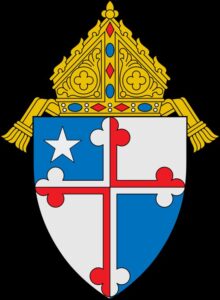 Coat of arms of the Roman Catholic Archdiocese of Baltimore, featuring a shield with ecclesiastical symbols representing the Catholic Church.