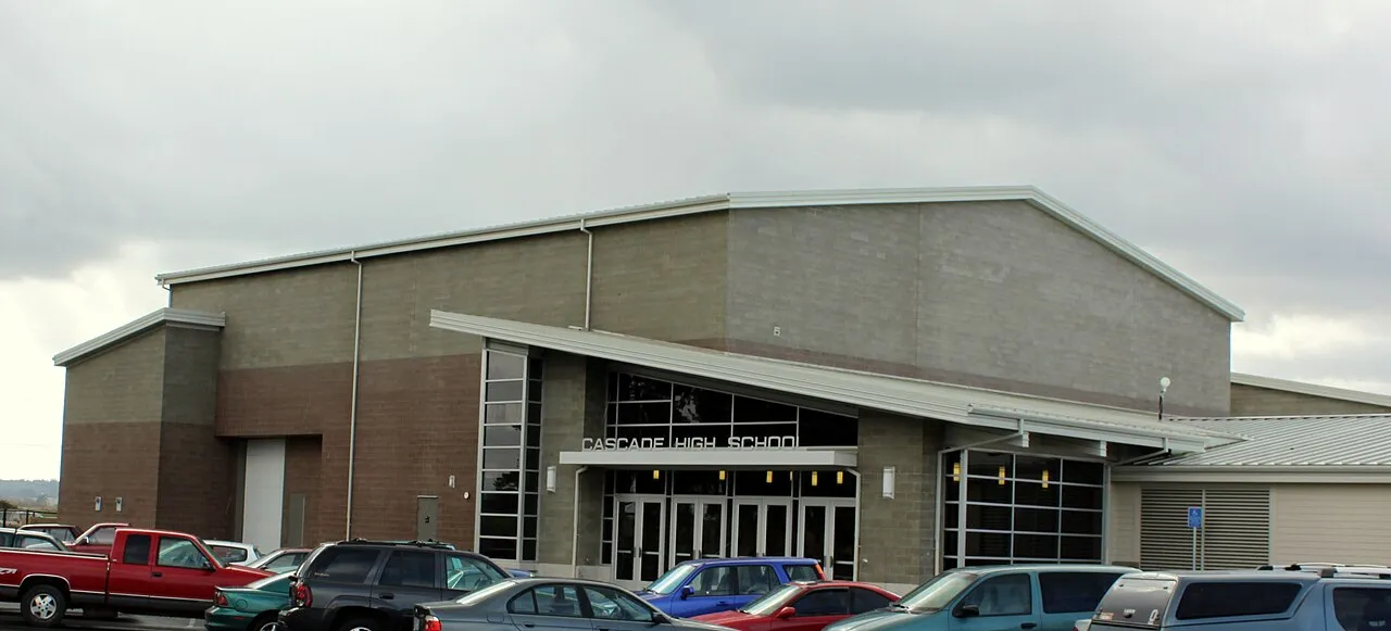 Cascade High School entrance with parking lot in front, Turner, Oregon.