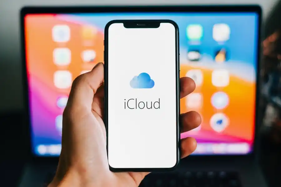 Smartphone displaying the iCloud logo, illustrating coverage of West Virginia’s lawsuit accusing Apple’s iCloud platform of failing to prevent storage of child sexual abuse material.