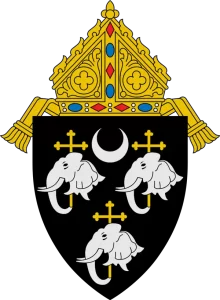 Coat of arms of the Diocese of Camden, accompanying coverage of the Diocese’s $180M clergy sexual abuse settlement in New Jersey.