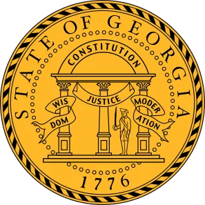 Colored Great Seal of the State of Georgia featuring the state coat of arms with pillars, arch, and motto ‘Wisdom, Justice, Moderation.