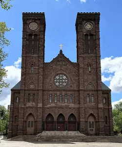 cathedral-saints-peter-paul-providence-under-100kb Cathedral of Saints Peter and Paul in Providence, Rhode Island, under a bright blue sky.