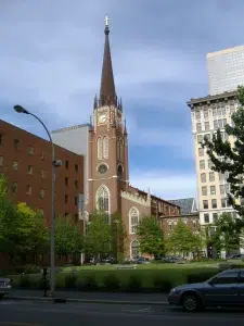 cathedral-assumption-louisville Cathedral of the Assumption in downtown Louisville, Kentucky, with its tall church steeple rising above surrounding buildings.