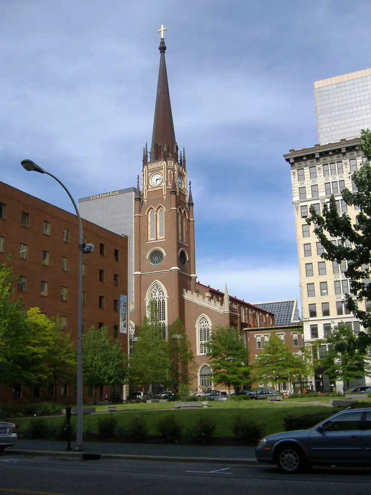 cathedral-assumption-louisville Cathedral of the Assumption in downtown Louisville, Kentucky, with its tall church steeple rising above surrounding buildings.